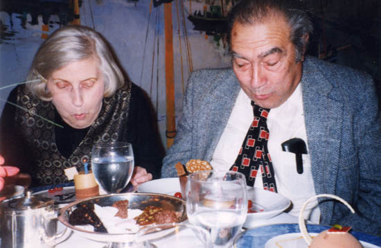 Rene & Chester blowing out candles